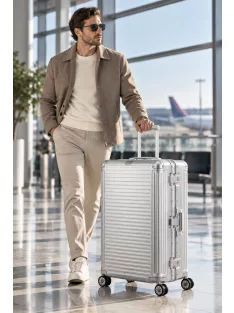   Travelite Next L ezüst nagy méretű prémium alumínium bőrönd