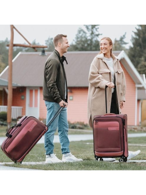 TRAVELITE Viia M rozé 4 kerekű bővíthető közepes bőrönd 