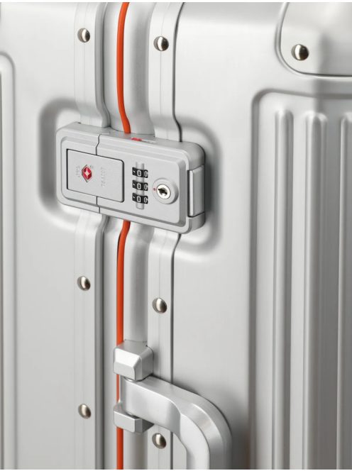 Travelite Next ezüst-narancs alumínium 4 kerekű csatos kabinbőrönd