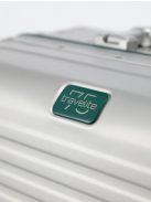 Travelite Next ezüst-zöld alumínium 4 kerekű csatos közepes bőrönd
