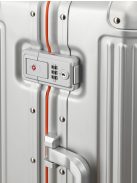 Travelite Next ezüst-narancs alumínium 4 kerekű csatos közepes bőrönd