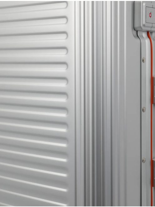 Travelite Next ezüst-narancs alumínium 4 kerekű csatos nagy bőrönd